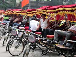 Rickshaws waiting to take you around Beijiing